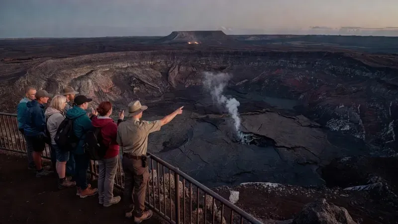 Guided group walking along the Kilauea crater rim at Hawaii Volcanoes National Park on a Big Island day tour from Kona Hawaii